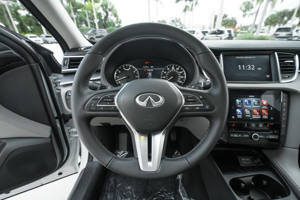 used 2025 INFINITI QX50 car, priced at $37,790