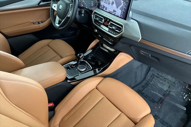 used 2023 BMW X4 car, priced at $47,250