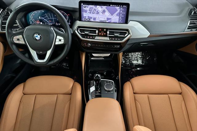 used 2023 BMW X4 car, priced at $47,250