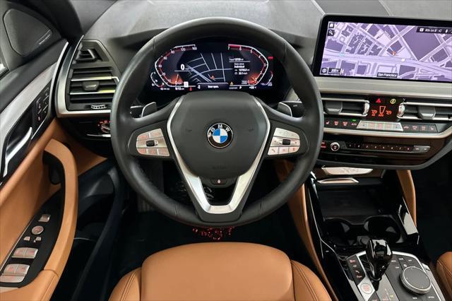used 2023 BMW X4 car, priced at $47,250