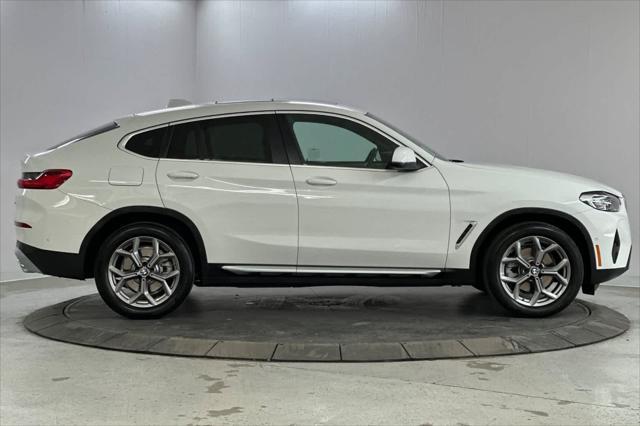 used 2023 BMW X4 car, priced at $47,250