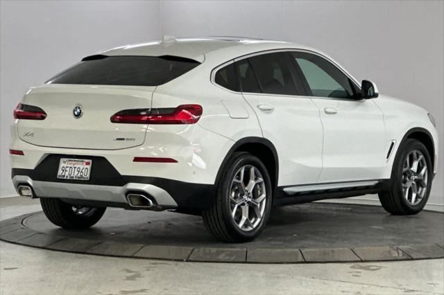 used 2023 BMW X4 car, priced at $47,250