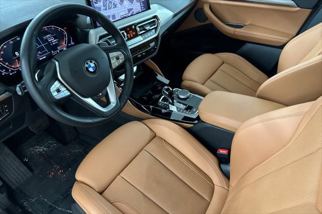 used 2023 BMW X4 car, priced at $47,250