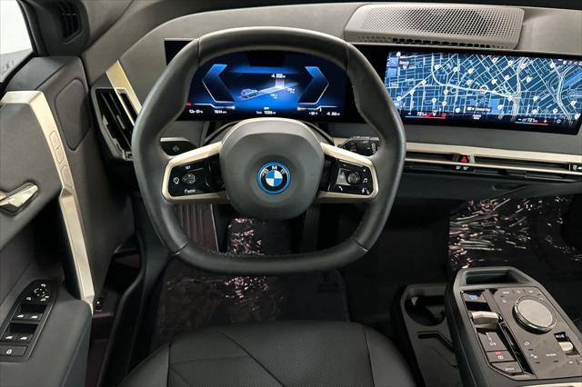 used 2023 BMW iX car, priced at $52,750