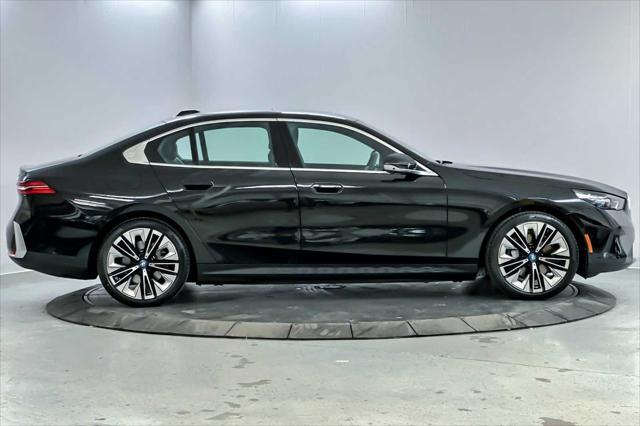 used 2024 BMW i5 car, priced at $56,998