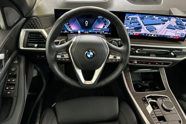used 2024 BMW X5 car, priced at $57,000