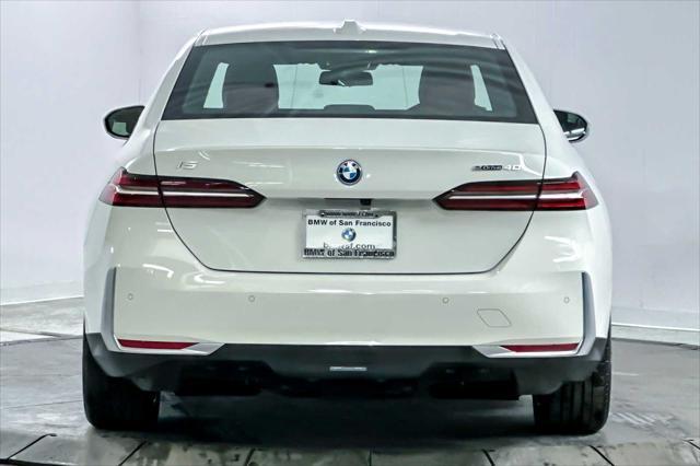 used 2024 BMW i5 car, priced at $58,918