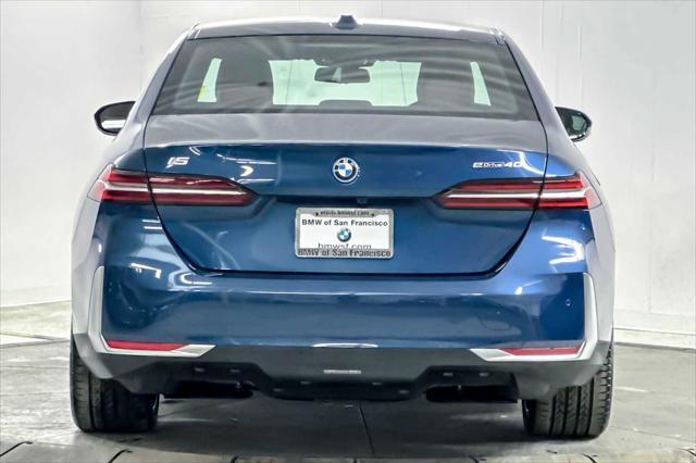 used 2024 BMW i5 car, priced at $63,998