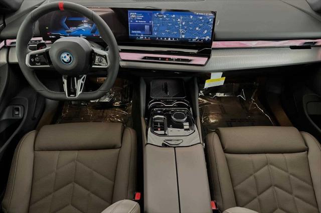 used 2024 BMW i5 car, priced at $73,210