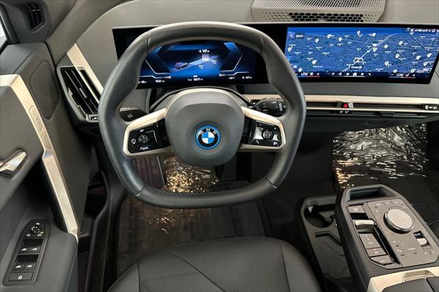 used 2024 BMW iX car, priced at $63,625