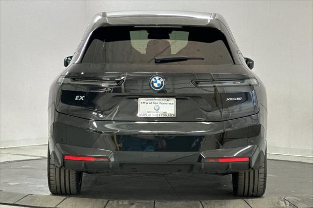 used 2024 BMW iX car, priced at $63,625