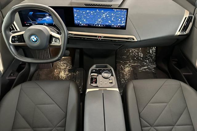 used 2024 BMW iX car, priced at $63,625