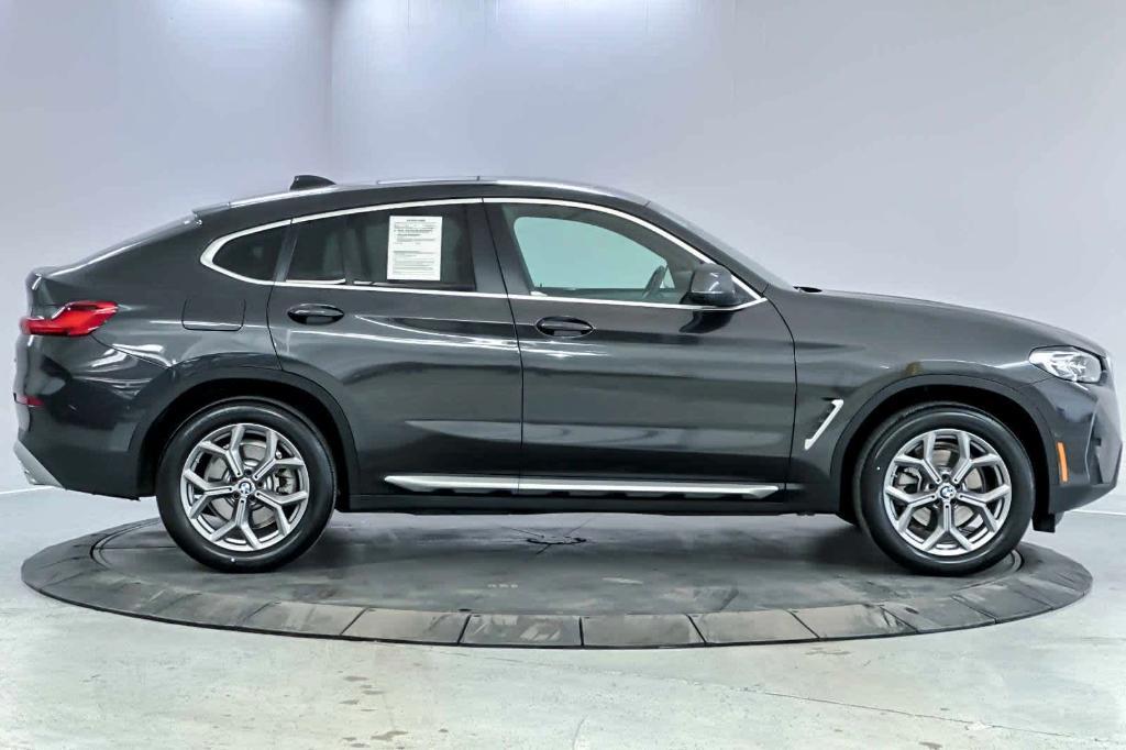 used 2024 BMW X4 car, priced at $50,998