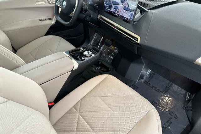 new 2026 BMW iX car, priced at $100,275