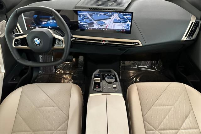 new 2026 BMW iX car, priced at $100,275
