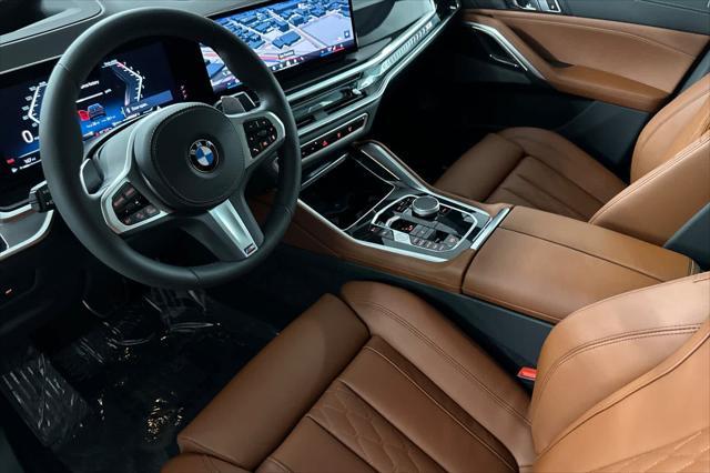 new 2025 BMW X6 car, priced at $88,690