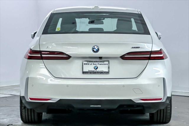 used 2024 BMW i5 car, priced at $58,199