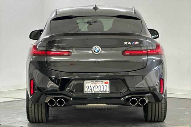 used 2022 BMW X4 M car, priced at $57,000