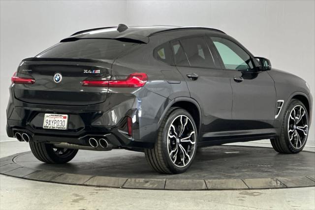 used 2022 BMW X4 M car, priced at $57,000