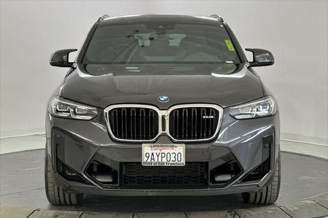 used 2022 BMW X4 M car, priced at $57,000