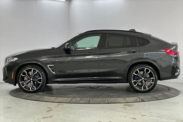 used 2022 BMW X4 M car, priced at $57,000