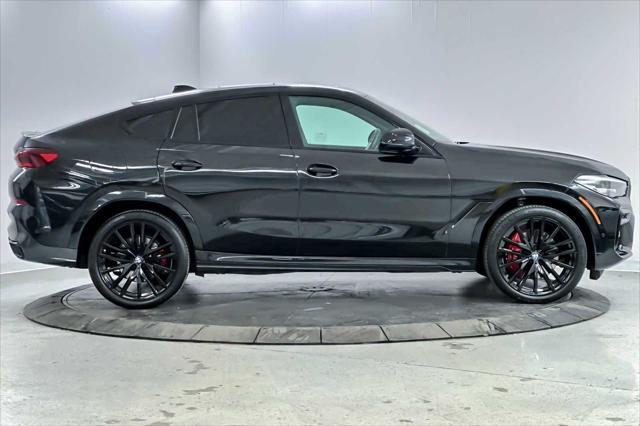 used 2022 BMW X6 car, priced at $62,298