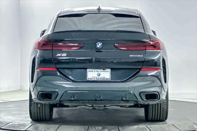 used 2022 BMW X6 car, priced at $62,298