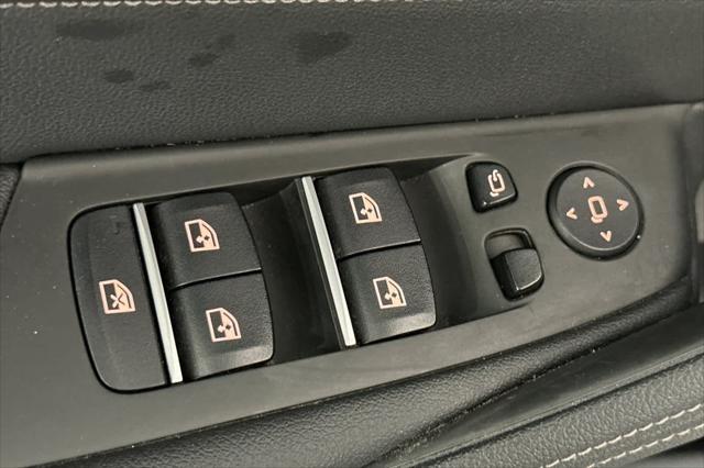 used 2023 BMW 530e car, priced at $33,000