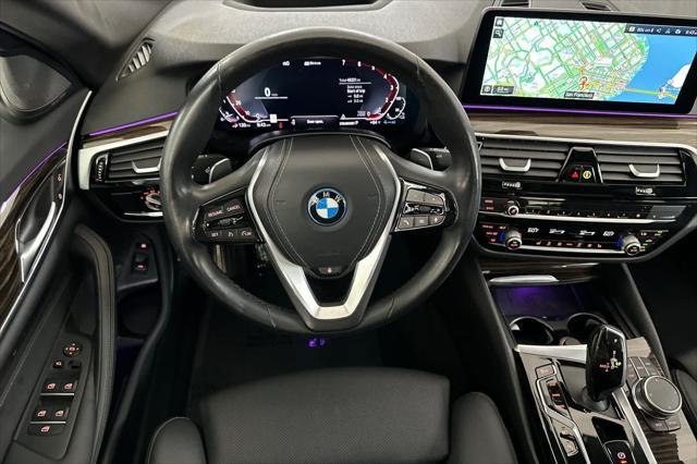 used 2023 BMW 530e car, priced at $33,000