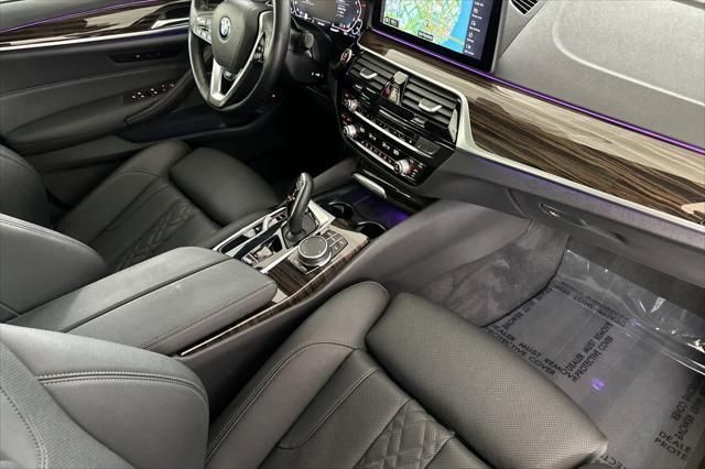 used 2023 BMW 530e car, priced at $33,000