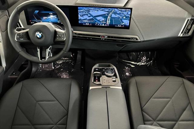 new 2025 BMW iX car, priced at $93,155