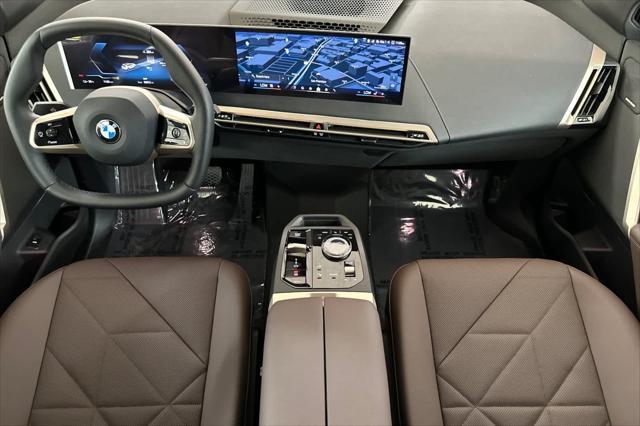 new 2026 BMW iX car, priced at $84,125