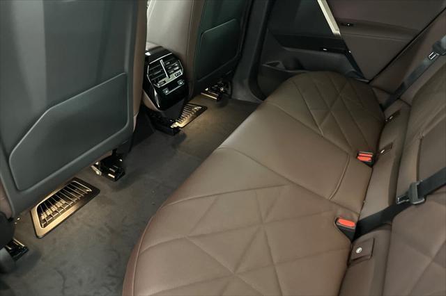 new 2026 BMW iX car, priced at $84,125