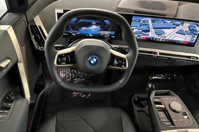 new 2025 BMW iX car, priced at $94,425