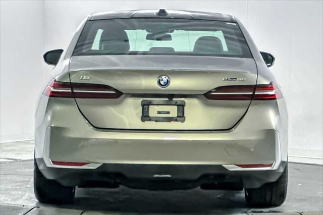 used 2024 BMW i5 car, priced at $59,898