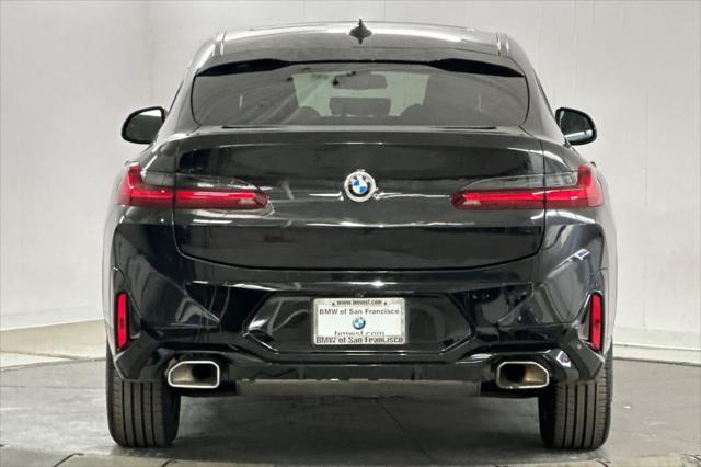 used 2022 BMW X4 car, priced at $39,750