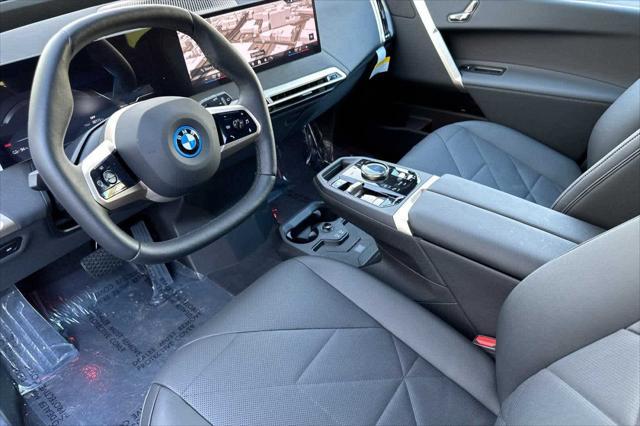 new 2025 BMW iX car, priced at $88,805