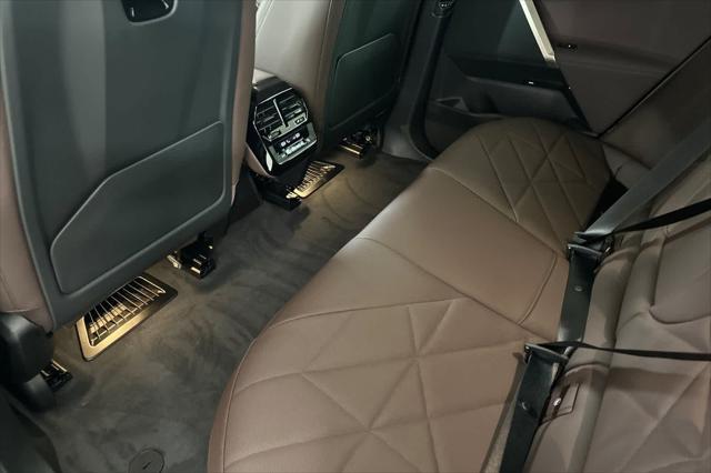 new 2026 BMW iX car, priced at $97,925