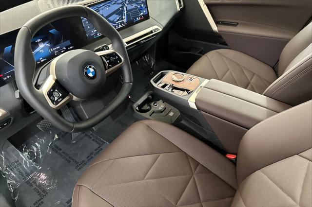 new 2026 BMW iX car, priced at $97,925