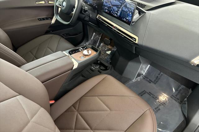 new 2026 BMW iX car, priced at $97,925
