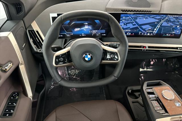 new 2026 BMW iX car, priced at $97,925