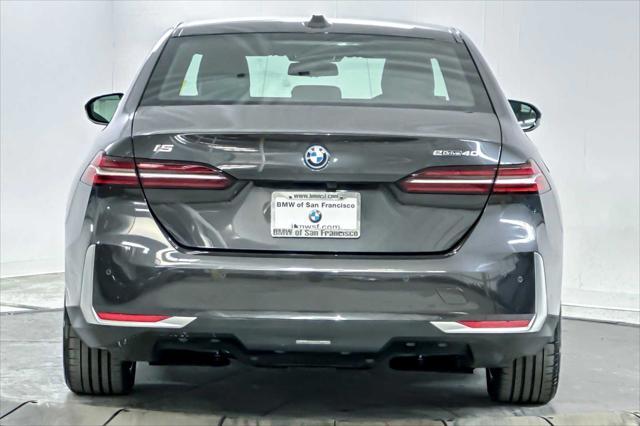 used 2024 BMW i5 car, priced at $58,098