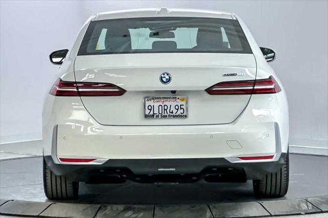 used 2024 BMW i5 car, priced at $58,317