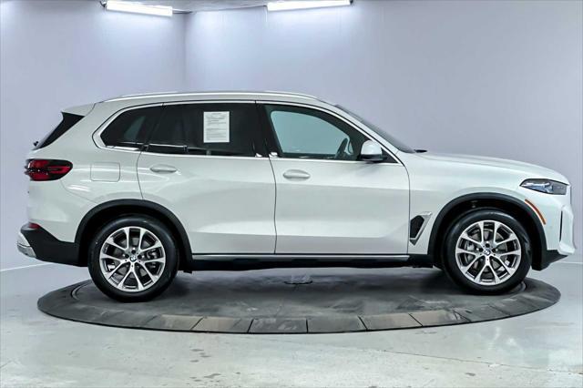 used 2024 BMW X5 car, priced at $61,103