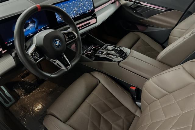 used 2024 BMW i5 car, priced at $69,707