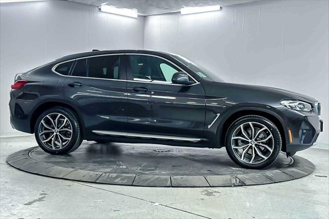 used 2022 BMW X4 car, priced at $40,407