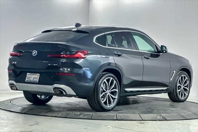 used 2022 BMW X4 car, priced at $40,407