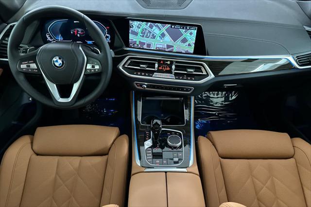 used 2023 BMW X5 PHEV car, priced at $64,000