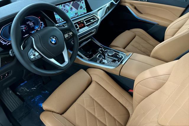 used 2023 BMW X5 PHEV car, priced at $64,000