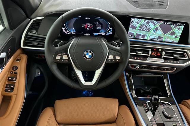 used 2023 BMW X5 PHEV car, priced at $64,000